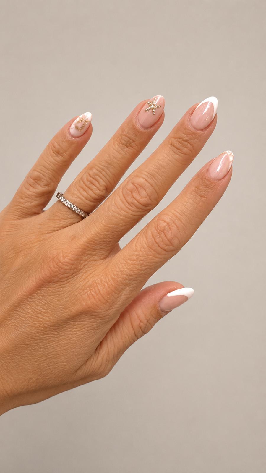 French tip nails with star and heart charms