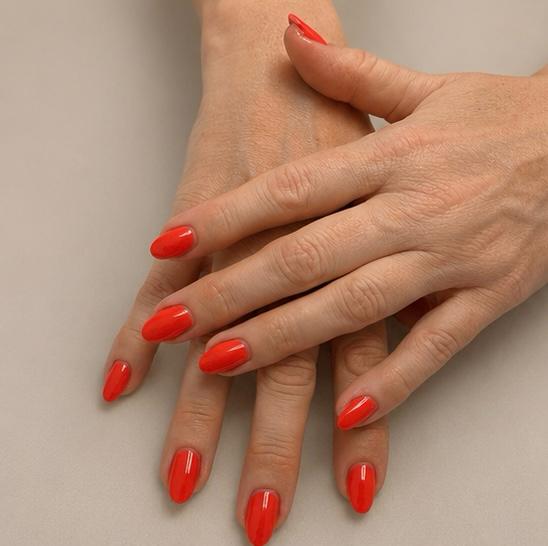 Bright red glossy manicure