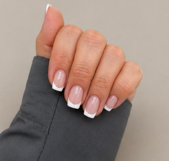 Classic white French tip manicure