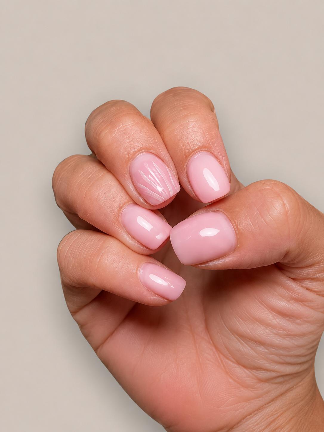 Soft pink glossy manicure with a fine line accent nail