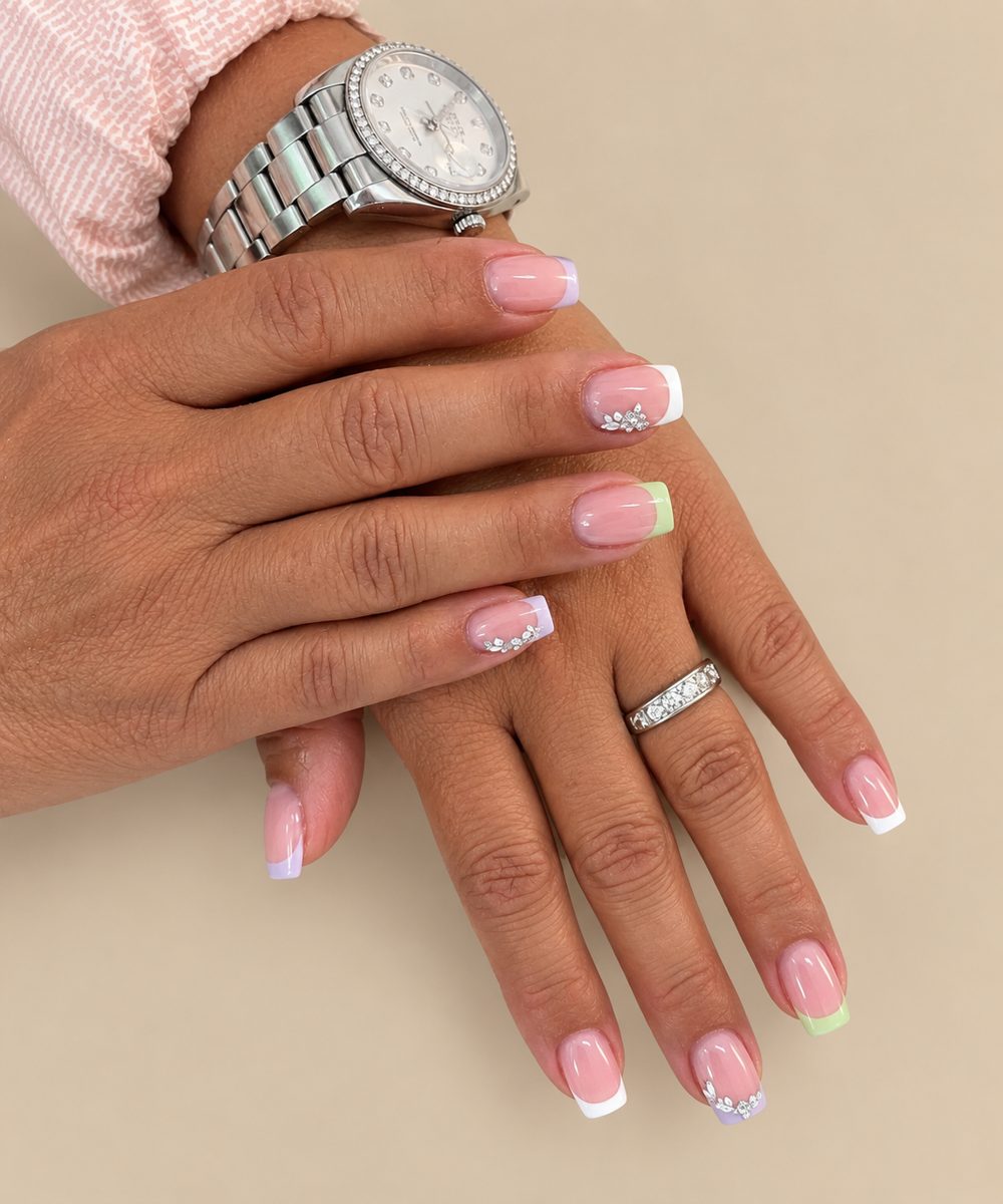 Pastel lilac, green and white French tips with silver flower gems